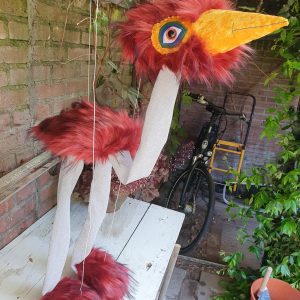 Loopvogel bordeaux met zilverkleurige benen