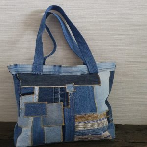 Spijkertas met stiksels